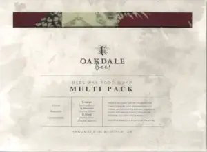 Tre bivokspapir, to med ananas på burgunder bakgrunn og et med humler på lys bakgrunn.